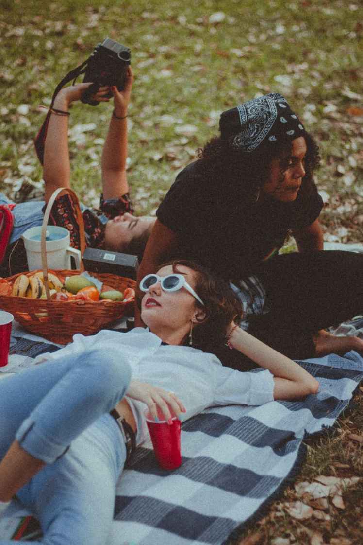 three women having a picnic